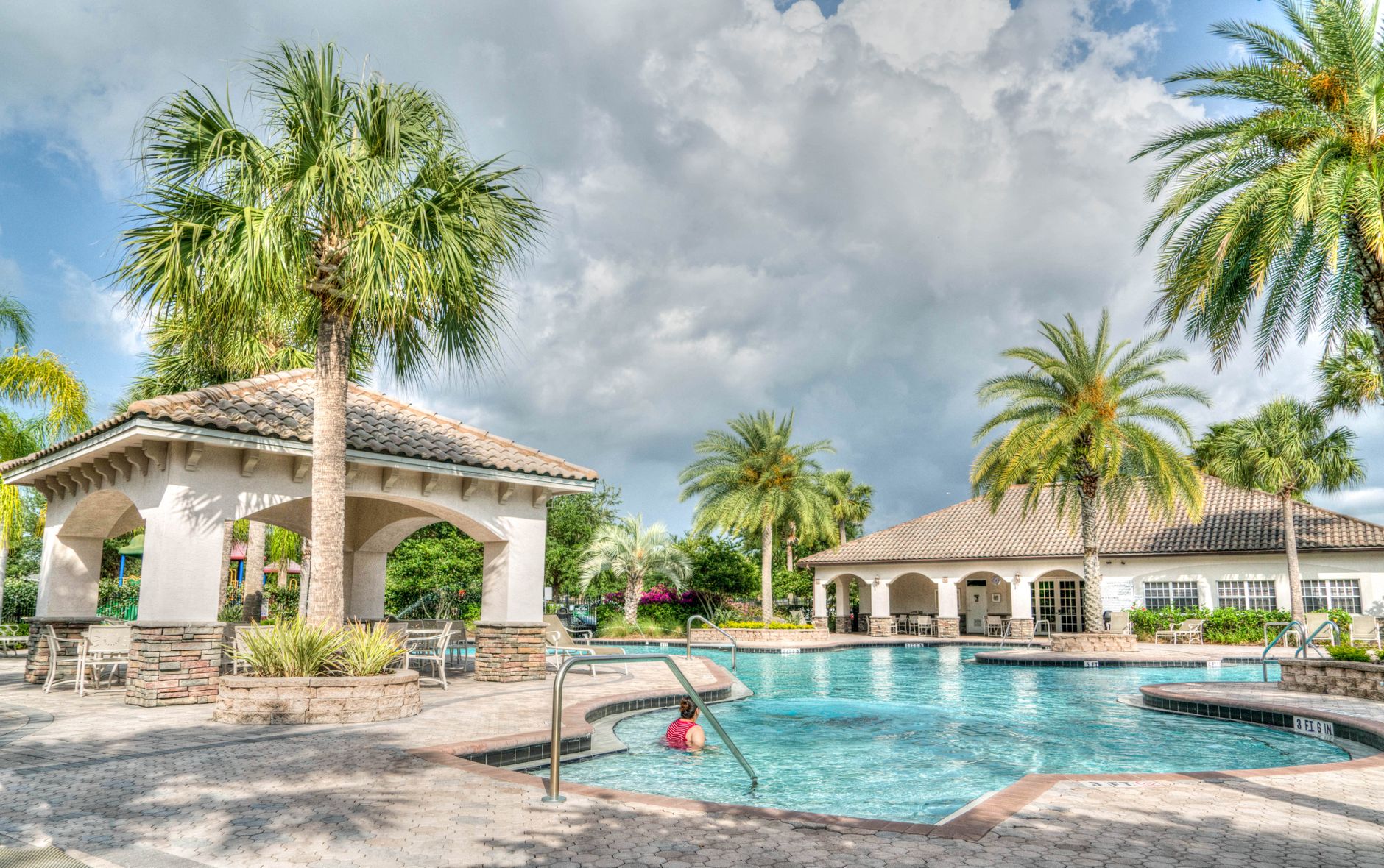 A crystal-clear pool serviced by A Greyt Pool Service